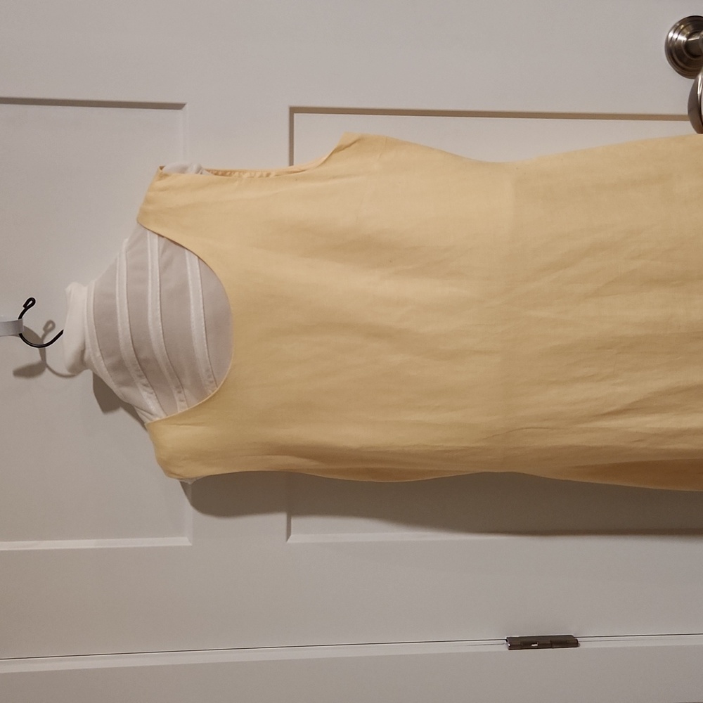 Summer sleeveless lined dress /jacket. Lovely soft pale yellow color Never worn!